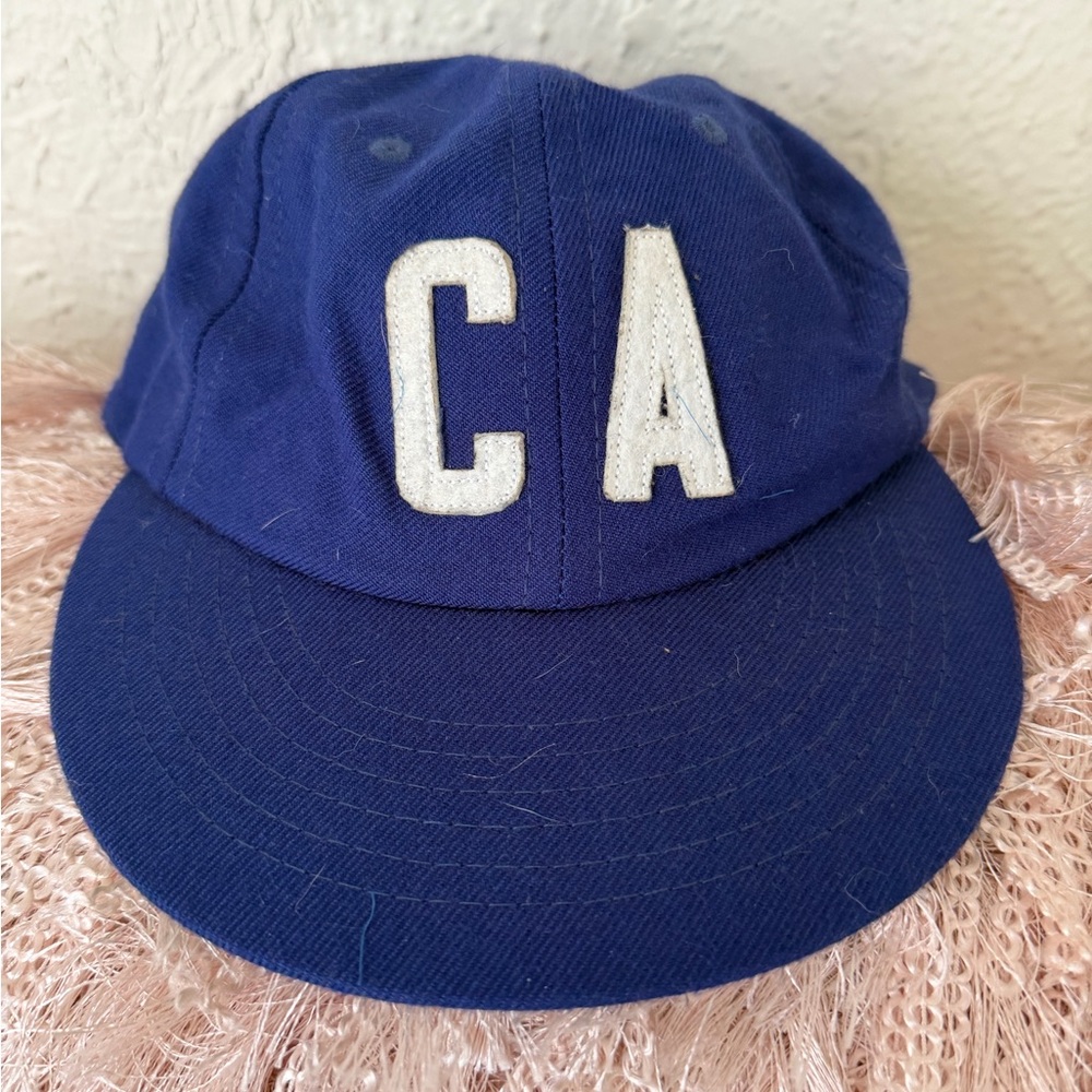 Free People Blue Baseball Cap with White 'CA' Iron & Resin